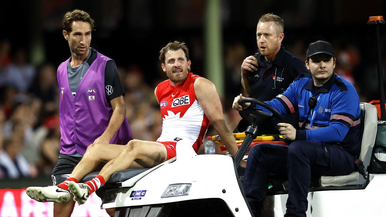 Harry Cunningham stretchered off. Photo by Phil Hillyard