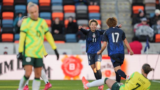 HOUSTON, TEXAS - FEBRUARY 20: Maika Hamano #17 of Japan celebrates scoring with Mina Tanaka #11 during the second half against Australia during a SheBelieves Cup match at Shell Energy Stadium on February 20, 2025 in Houston, Texas. (Photo by Brad Smith/ISI Photos/USSF/Getty Images for USSF)