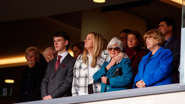 Barb Kerley and family members look on as Neil Kerley takes his final lap of honour at Adelaide Oval. Picture: AAP Image / Matt Turner