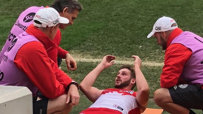 The moment Alex Johnson knew his fate: The Sydney Swans club doctor tells him he's likely torn his ACL. Picture: Supplied