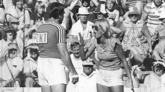 A fan jumps the fence to abuse Hartley during a game at Leichhardt Oval in 1980.