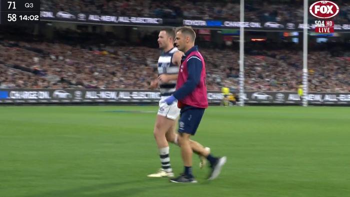 Patrick Dangerfield limps from the field in a massive blow for Geelong.