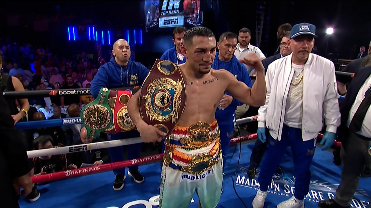 Teofimo Lopez celebrates his win.