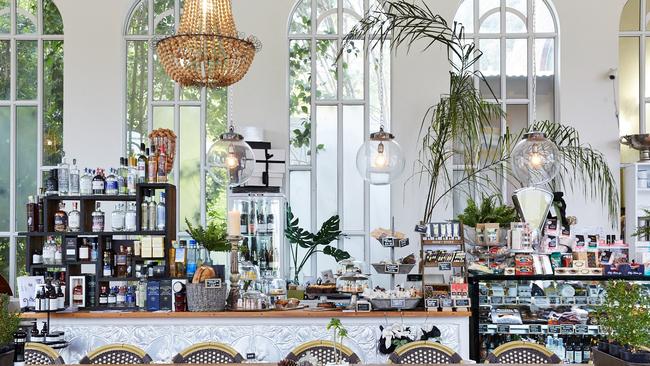 The Tasmanian Food and Wine Conservatory’s pressed-tin service counter is groaning with goodies from Tasmanian gins to Anvers chocolate truffles. Picture: GLENN MASON