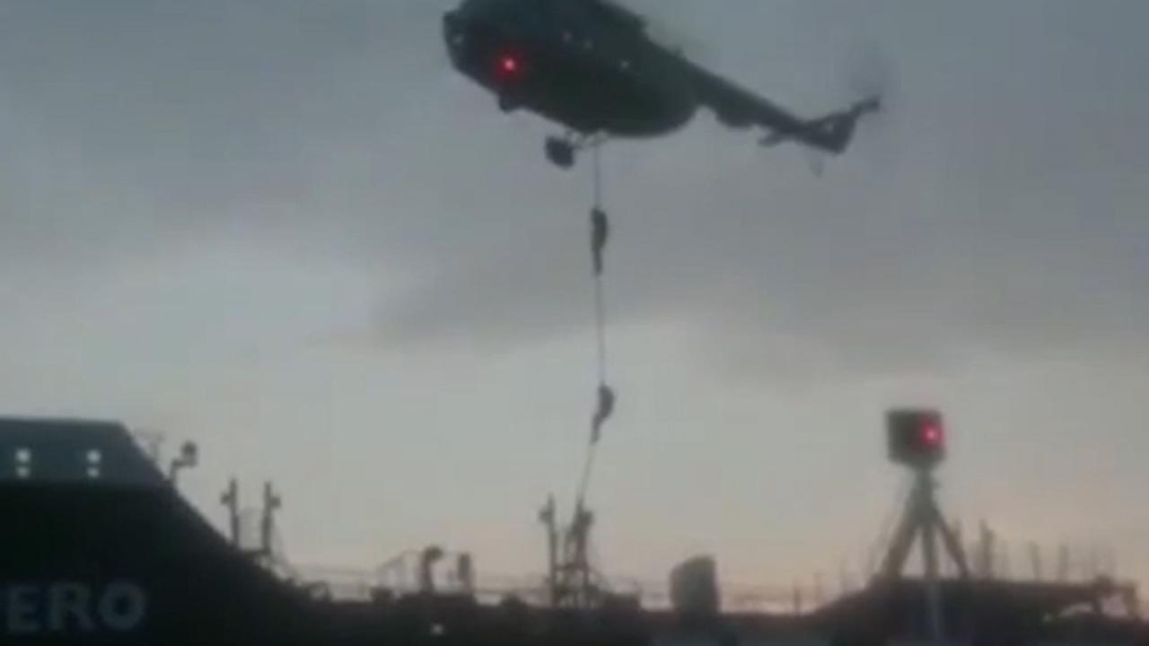 This image grab taken from a video provided by Iran's Revolutionary Guard official website on July 20, 2019, shows Revolutionary Guard Corps boarding a British-flagged tanker in the Strait of Hormuz. (Photo by HO / various sources / AFP)