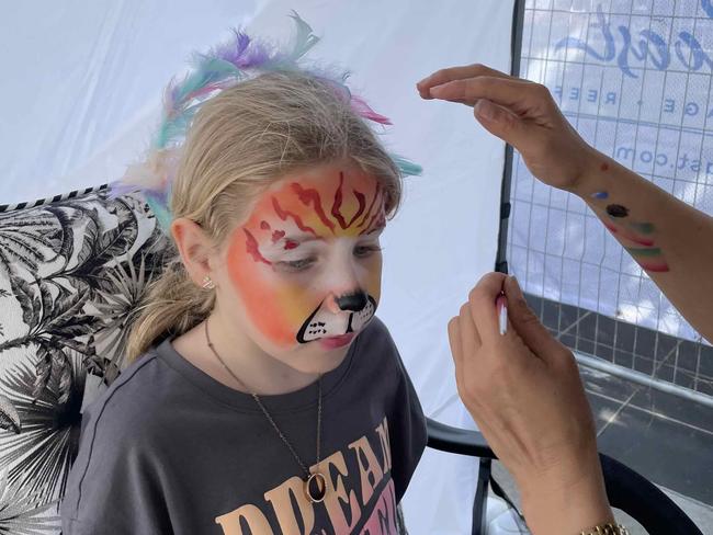 Emma with tiger face paint at the Fraser Coast Flavours Festival at Seafront Oval on September 1, 2023.