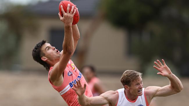 Sam Darcy takes a mark over Alex Keath at Western Bulldogs training on Friday. Picture: Michael Klein