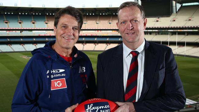 MELBOURNE, AUSTRALIA - AUGUST 26:   Paul Roos, Senior Coach of the Demons and Melbourne Demons President Glen Bartlett during a Melbourne Demons media conference at the Melbourne Cricket Ground on August 26, 2016 in Melbourne, Australia.  Roos held his final media conference as senior coach of the Demons. (Photo by Scott Barbour/AFL Media)