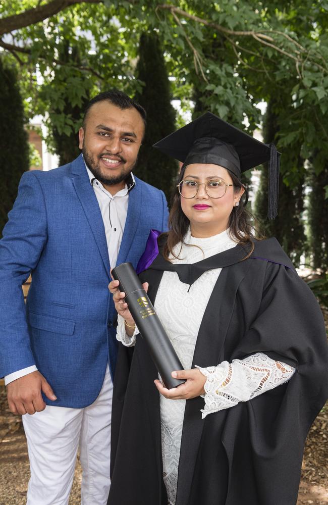 Raenal Chand congratulates his wife, Sheraleen Kumar, on her Juris Doctor graduation at a UniSQ graduation ceremony at Empire Theatres, Tuesday, February 13, 2024. Picture: Kevin Farmer