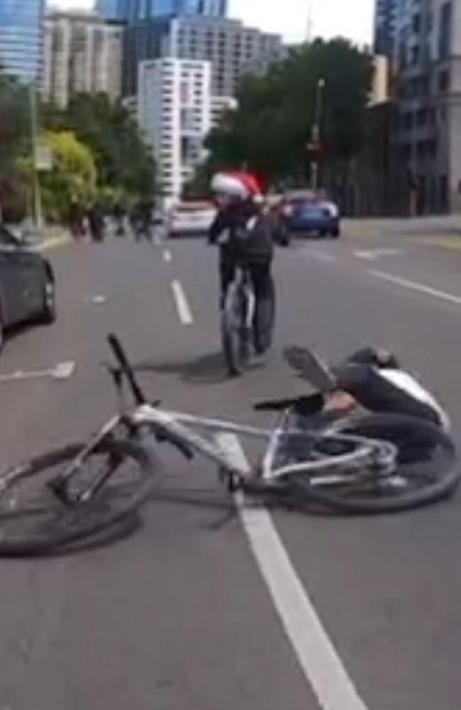 A youth falls from his bike after a stunt. Picture: Social Media