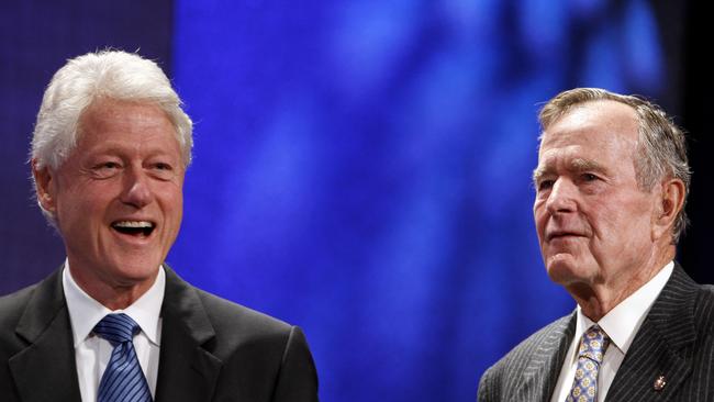 Former Presidents Bill Clinton and George HW Bush in 2008.