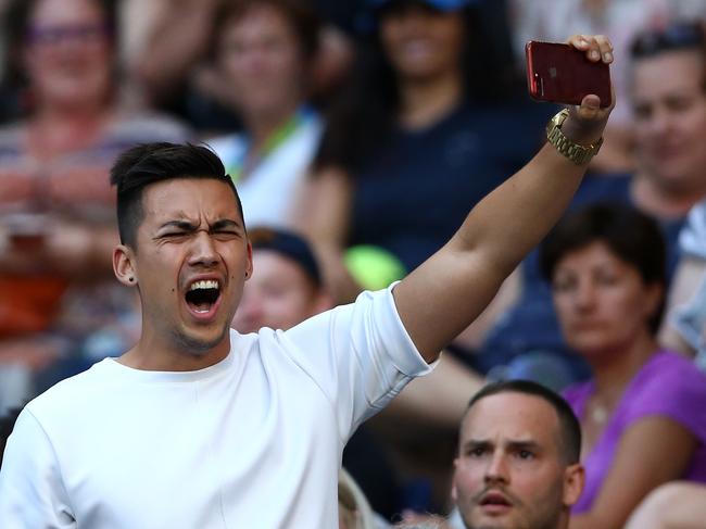 MELBOURNE, AUSTRALIA - JANUARY 17:  A spectator interrupts the second round match between Nick Kyrgios of Australia and Viktor Troicki of Serbia on day three of the 2018 Australian Open at Melbourne Park on January 17, 2018 in Melbourne, Australia.  (Photo by Clive Brunskill/Getty Images)