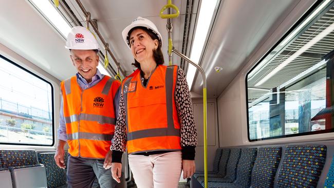 Transport Minister Andrew Constance and Premier Gladys Berejiklian inspect a new train. Picture: Monique Harmer