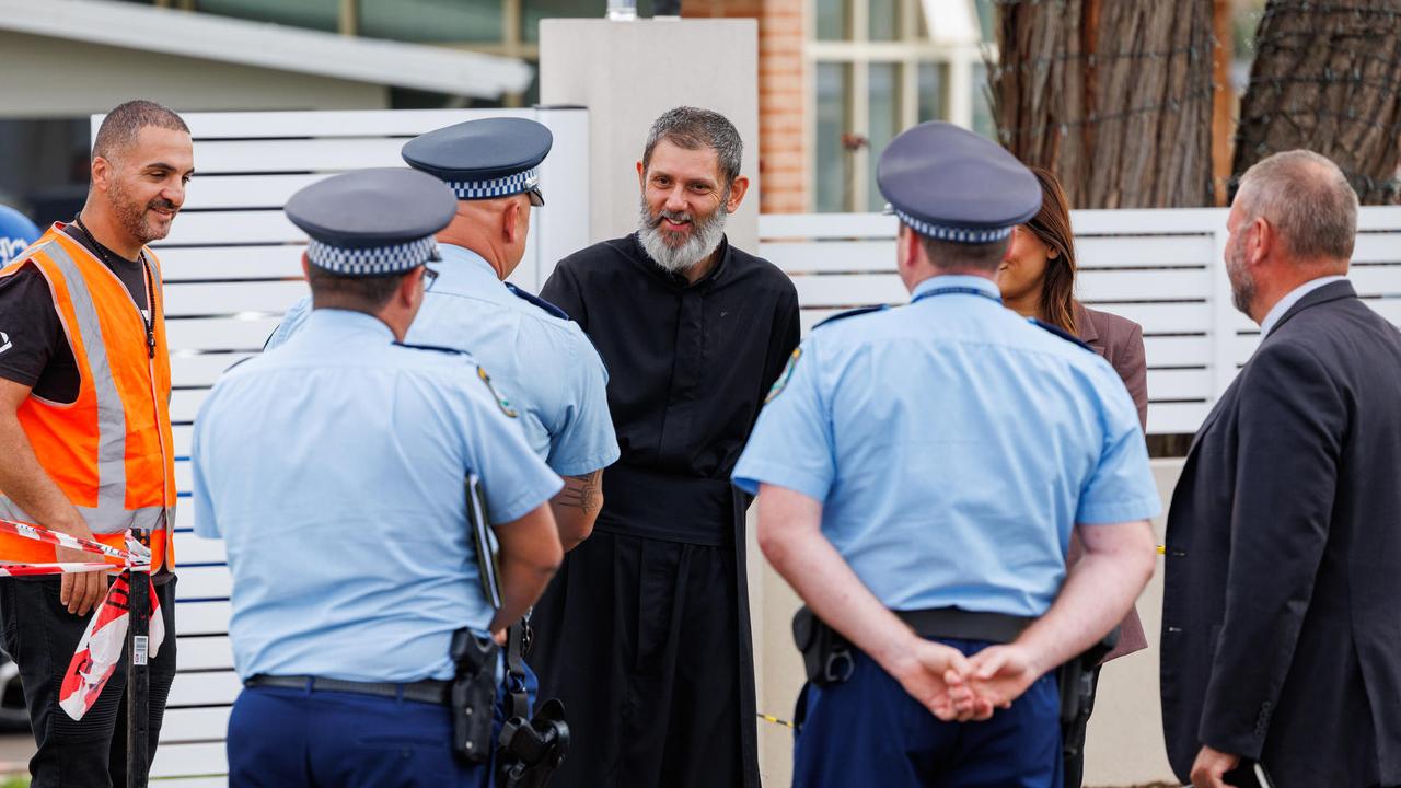 Church members meet emergency crews. Picture: NCA NewsWire / David Swift