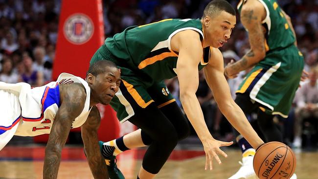 Dante Exum #11 of the Utah Jazz steals the ball from Jamal Crawford #11 of the Los Angeles Clippers.