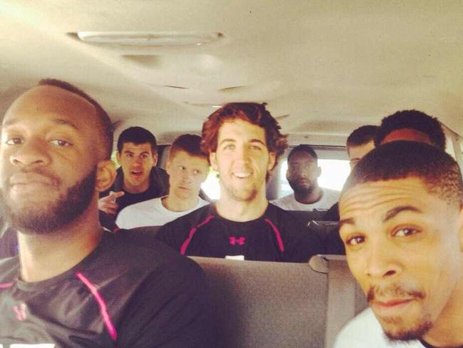 Alex Aurrichio (centre) on a bus going to the U.S Australian Rules International Combine in 2014. Picture: Supplied.