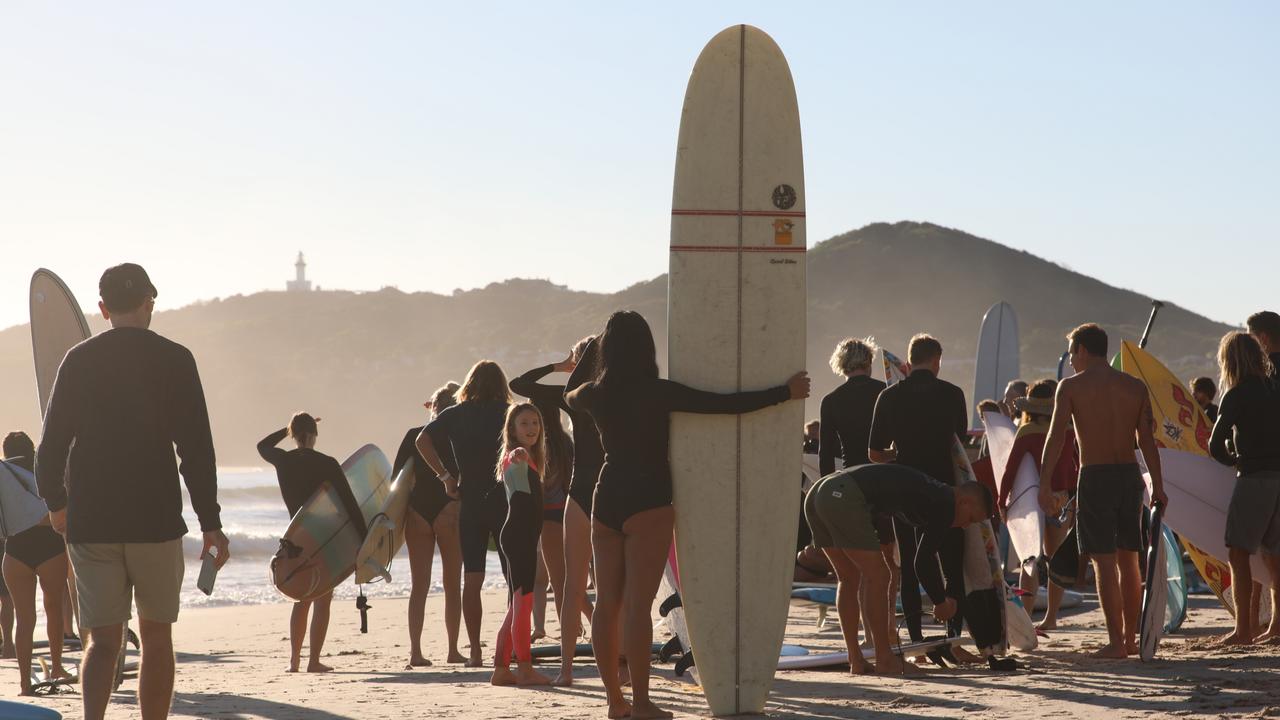 Members of the public took part in a paddle-out at Byron Bay's Main Beach to protest against the planned Netflix reality show Byron Baes on the morning of Tuesday, April 20, 2021. Picture: Liana Boss