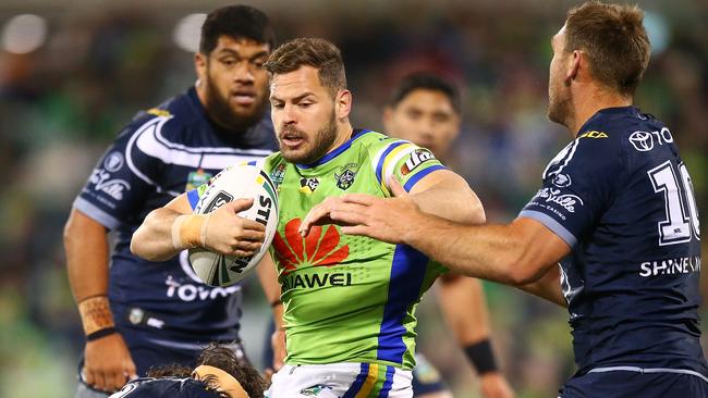 CANBERRA, AUSTRALIA - JULY 14: Aiden Sezer of the Raiders is tackled during the round 18 NRL match between the Canberra Raiders and the North Queensland Cowboys at GIO Stadium on July 14, 2018 in Canberra, Australia. (Photo by Mark Nolan/Getty Images)