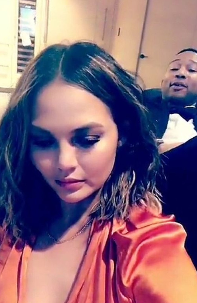 Chrissie Teigen and John Legend were feeling a little worse for wear, posting a hilarious drunken Snapchat video. Picture: Snapchat