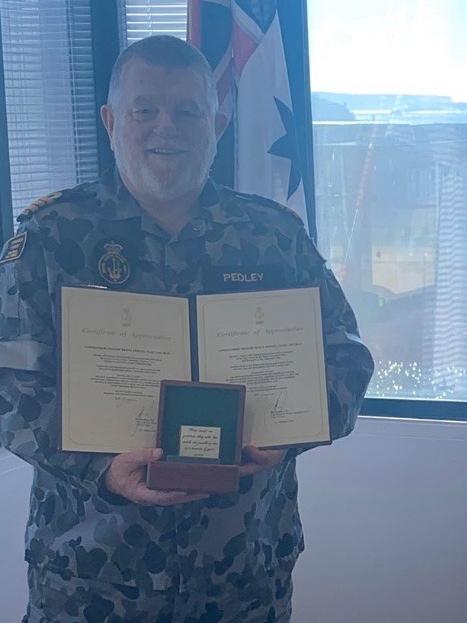 Picture of Graeme Bruce Pedley being recognised for 45 years of service as a Commander in the Australian Navy. Picture: Twitter