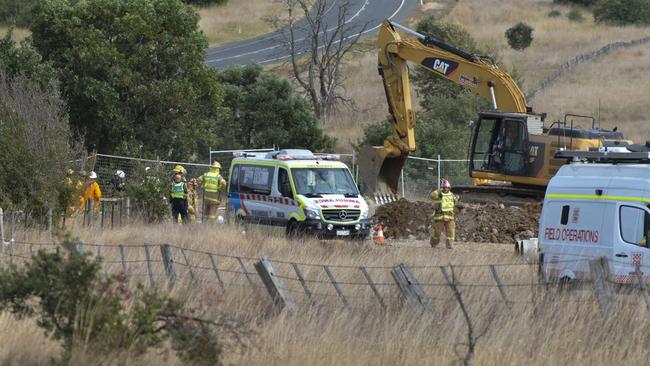 Emergency crews working to free Mr Brownlee.