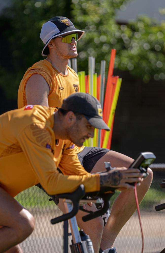 Chad Wingard and Mitch Lewis on the bike. Picture: Hawthorn FC