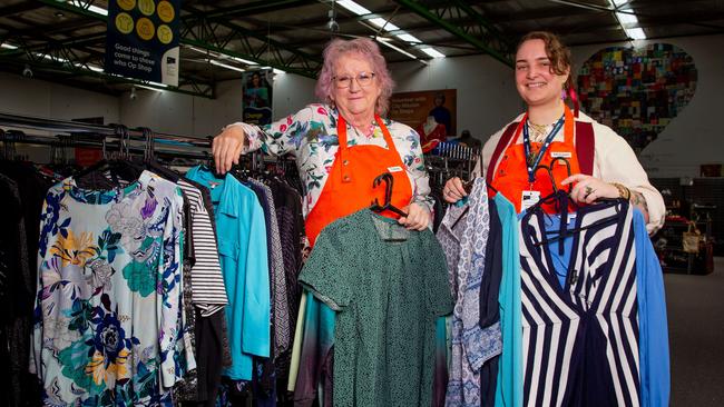 Op-shop volunteers Tracey Pell and Morgan Phillips with items for sale at the Hobart City mission Op Shop in Moonah. Picture: Linda Higginson