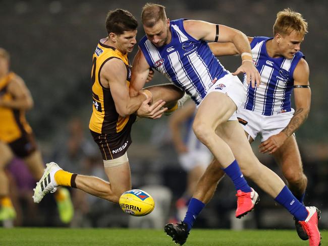 MELBOURNE, AUSTRALIA - JUNE 28: Luke Breust of the Hawks and Josh Walker of the Kangaroos collide during the 2020 AFL Round 04 match between the Hawthorn Hawks and the North Melbourne Kangaroos at Marvel Stadium on June 28, 2020 in Melbourne, Australia. (Photo by Michael Willson/AFL Photos via Getty Images)