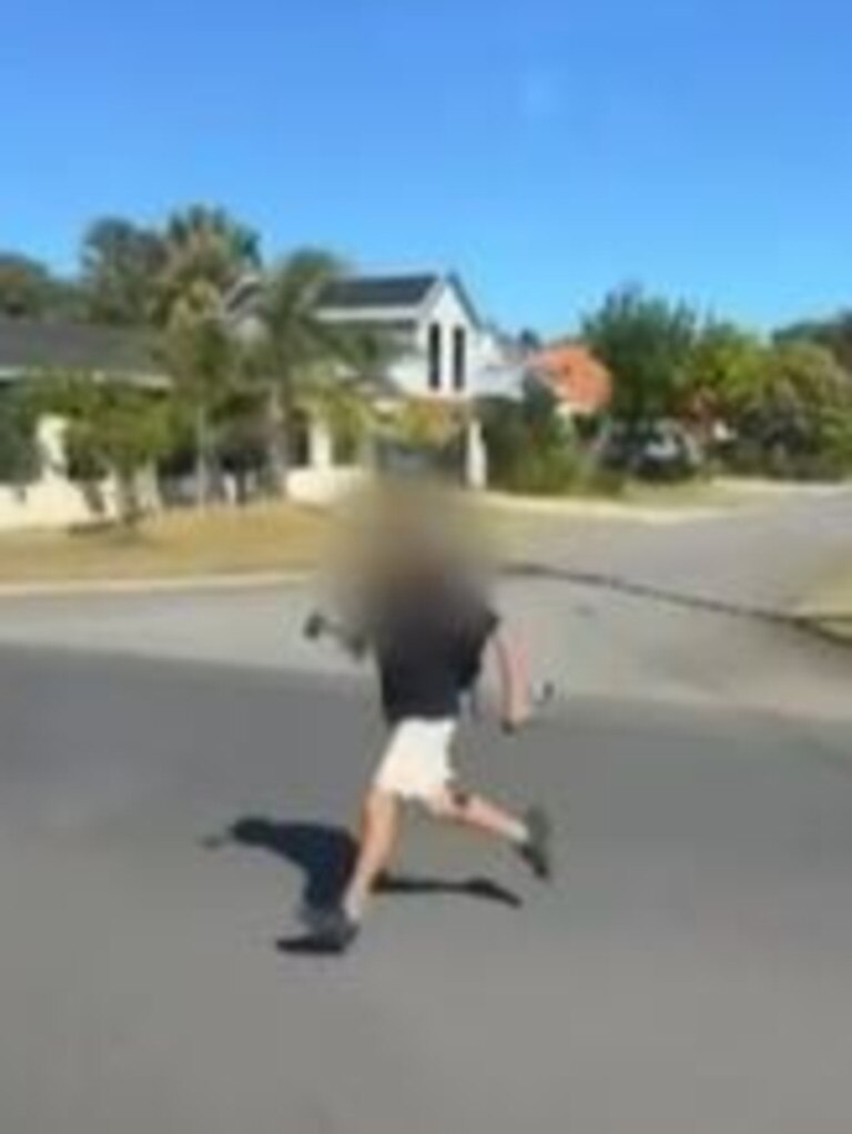 The woman was filmed charging towards the bus with an axe on Thursday. Picture: 9News