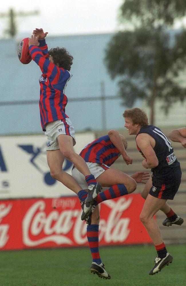 Jeremy Clayton flying for Port Melbourne.