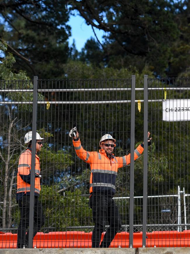 Tradies are thrilled to have hit the half way mark in the mammoth project. Picture: Penny Stephens