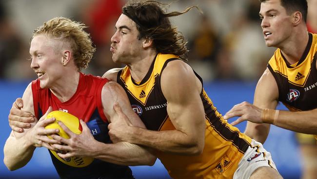 Jai Newcombe tackles Clayton Oliver at the MCG on Saturday. Picture: Darrian Traynor/AFL Photos