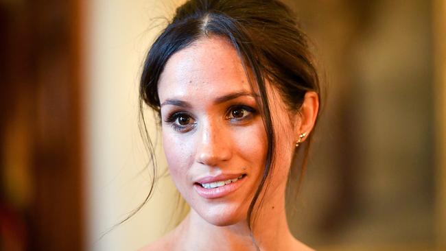 CARDIFF, WALES - JANUARY 18: Meghan Markle chats with people inside the Drawing Room during a visit to Cardiff Castle on January 18, 2018 in Cardiff, Wales. (Photo by Ben Birchall - WPA Pool / Getty Images)