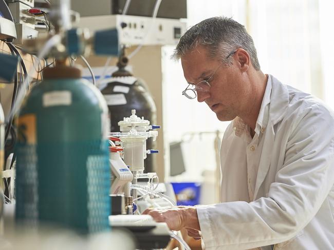 Artificial womb ... Australian doctor Marcus Davey at work in the lab. Picture: Supplied