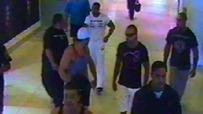 CCTV footage from Sydney Airport. The man dressed in white is Mick Hawi, who was found guilty the murder of rival bikie Anthony 