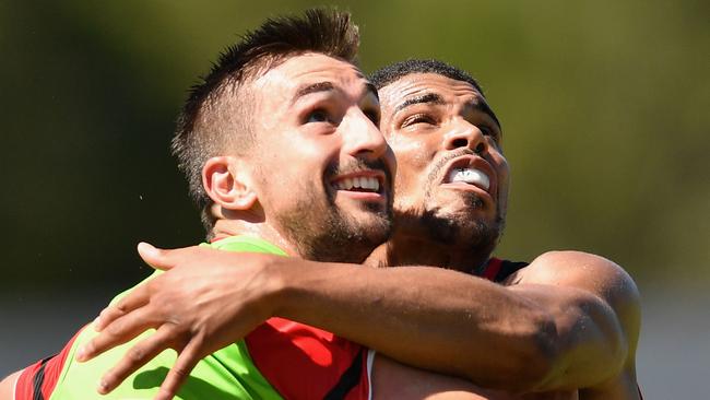 Billy Longer, left, wrestles with fellow Saint Jason Homes at pre-season training. Picture: Quinn Rooney (Getty Images)
