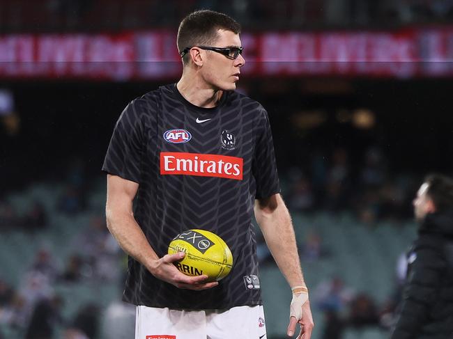 ADELAIDE, AUSTRALIA - JULY 22: Mason Cox of the Magpies warms up during the 2023 AFL Round 19 match between the Port Adelaide Power and the Collingwood Magpies at Adelaide Oval on July 22, 2023 in Adelaide, Australia. (Photo by James Elsby/AFL Photos via Getty Images)