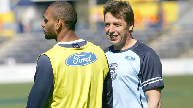 Travis Varcoe with coach Mark Thompson.