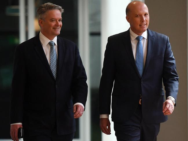 Matthias Cormann and Peter Dutton would serve as finance and defence ministers, respectively. Picture: Sam Mooy