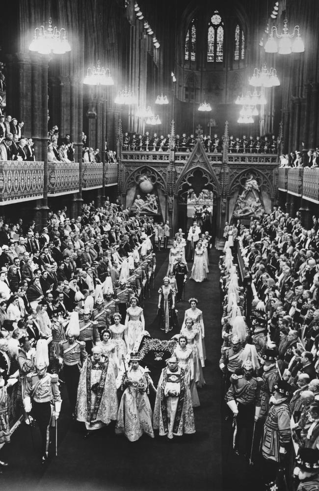 Queen Elizabeth II walks down the nave in Westminster Abbey after being crowned. Picture: Hulton-Deutsch Collection/CORBIS/Corbis via Getty Images