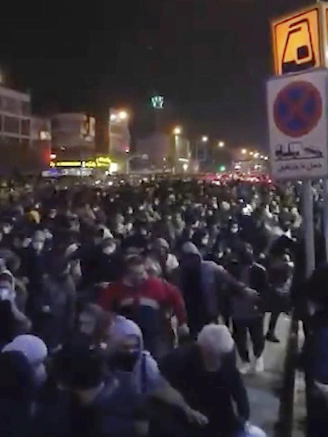 A crowd fleeing police near Azadi in Tehran. Picture: Center for Human Rights in Iran