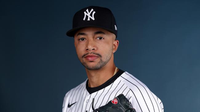 Devin Williams kept his stumble for his team photo. (Photo by Elsa/Getty Images)