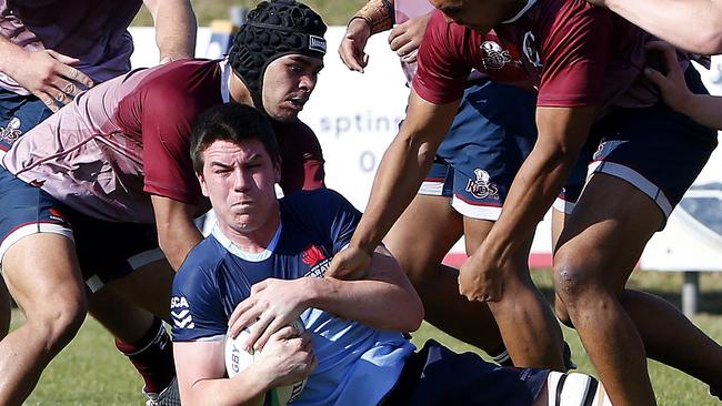 Waratahs' Eamon Doyle with the ball in an U18s NSW Waratahs v Queensland Reds battle. Picture: John Appleyard