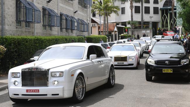 Mourned ... Luxury cars at Hawi’s funeral last month. Picture: AAP