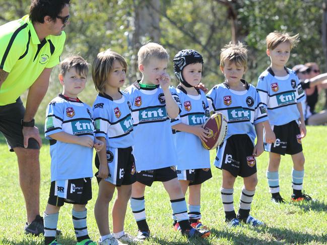 Terrigal player get ready to kick off in the junior football competition at Doyalson North earlier this year. (AAP image/Mark Scott )