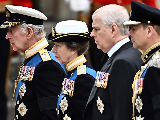 Britain's King Charles III, Britain's Princess Anne, Princess Royal, Britain's Prince Andrew, Duke of York and Britain's Prince Edward, Earl of Wessex arrive at Westminster Abbey in London on September 19, 2022, for the State Funeral Service for Britain's Queen Elizabeth II. - Leaders from around the world will attend the state funeral of Queen Elizabeth II. The country's longest-serving monarch, who died aged 96 after 70 years on the throne, will be honoured with a state funeral on Monday morning at Westminster Abbey. (Photo by Marco BERTORELLO / AFP)