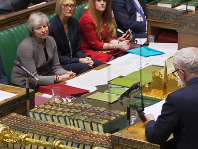 A video grab from footage broadcast by the UK Parliament's Parliamentary Recording Unit (PRU) shows Britain's Prime Minister Theresa May (L) listening as opposition Labour Party leader Jeremy Corbyn (R) announces that he will table a motion of no confidence in Theresa May, in the House of Commons in London on December 17, 2018, following her statement on her attendance at an EU Summit last week. - Prime Minister Theresa May will on Monday warn MPs against supporting a second Brexit referendum, as calls mount for a public vote to break the political impasse over the deal she struck with the EU. "Let us not break faith with the British people by trying to stage another referendum," she will tell parliament, according to extracts from her speech released by Downing Street. (Photo by HO / PRU / AFP) / RESTRICTED TO EDITORIAL USE - MANDATORY CREDIT " AFP PHOTO / PRU " - NO USE FOR ENTERTAINMENT, SATIRICAL, MARKETING OR ADVERTISING CAMPAIGNS