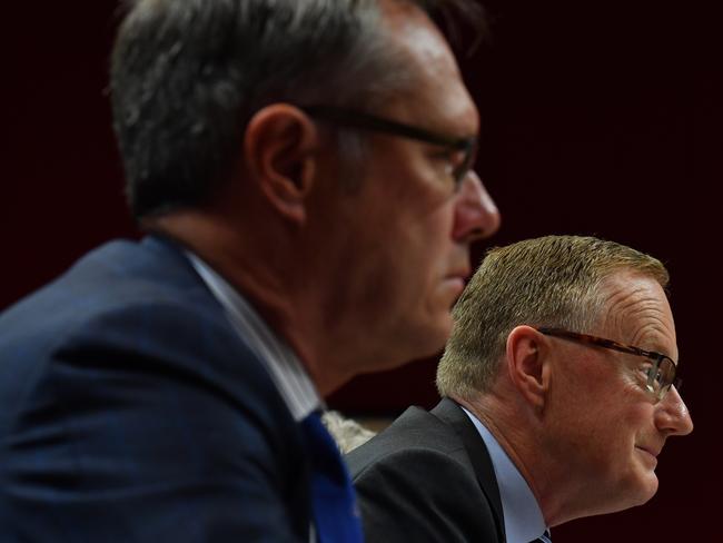 Governor of the Reserve Bank of Australia (RBA), Dr Philip Lowe (right) and Deputy Governor Guy Debelle (left) address the House of Representatives Standing Committee on Economics, at NSW State Parliament in Sydney in Sydney, Friday, February, 22, 2019. (AAP Image/Dean Lewins) NO ARCHIVING