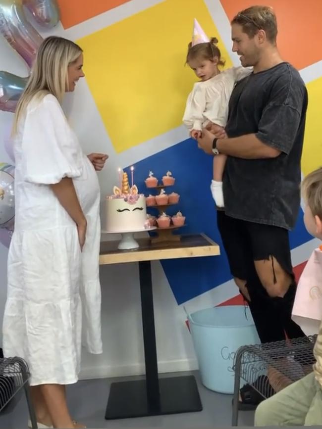 Jack de Belin and girlfriend Alyce Taylor smile and sing at a birthday party for their daughter Billie Maree. Picture: Instagram