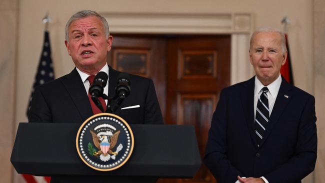 King Abdullah II of Jordan speaks to the press as US President Joe Biden looks on in the Cross Hall of the White House in Washington, DC. Picture: Jim Watson/AFP